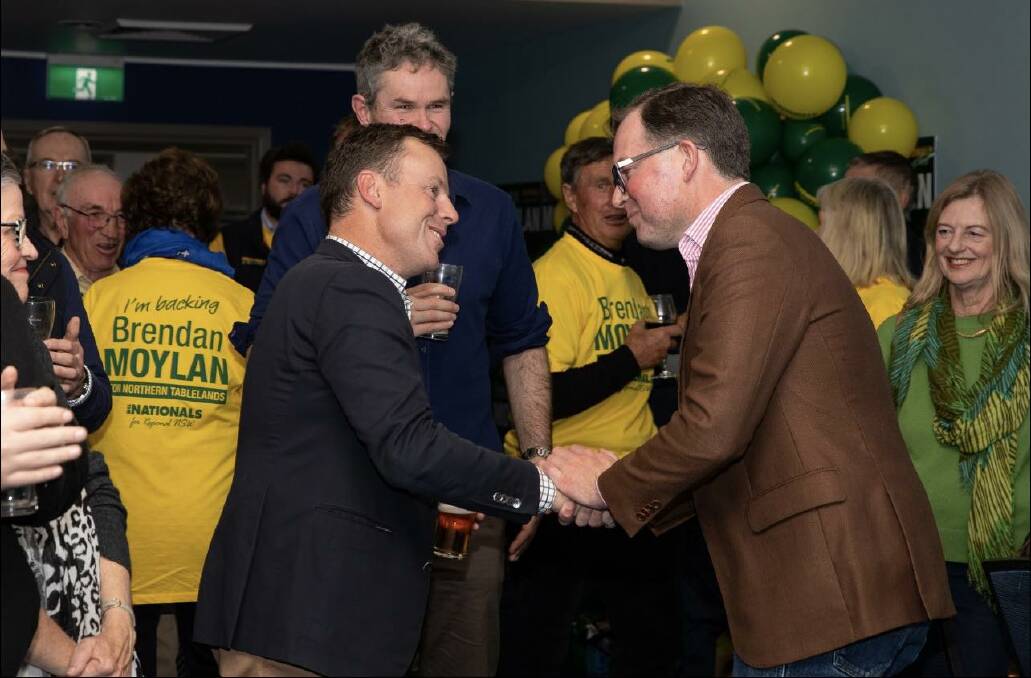 Mr Moylan receives congratulations from outgoing NSW MP Adam Marshall on election night. Picture supplied by the NSW Nationals