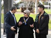 Secretary of the NSW Department of Education Murat Dizdar chats with Peel High Executive Principal Fiona Jackson and teacher Curtis Wolrige. Picture by Gareth Gardner