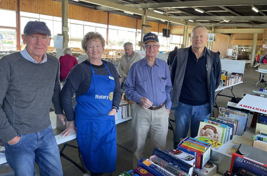From left to right, Perer Garlick, Becky Ingham-Broomfield, Ian Garske and Andrew Pratt. Just some of the dozens of hard working volunteers raising thousands of dollars for charity through the Rotary book fair in Armidale. Picture Heath Forsyth 