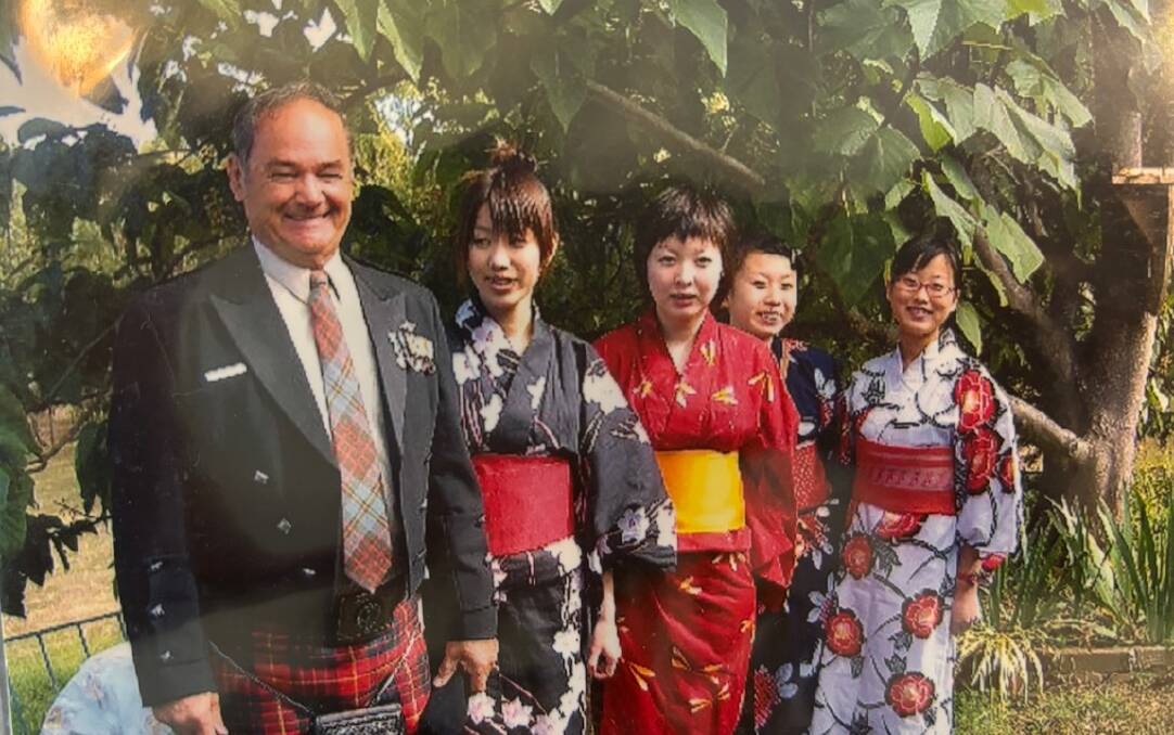 Japanese exchange students Yurie (second from left) and Manaka (far right) with their Armidale host John Cameron (left). Picture provided