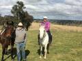 Bill Upjohn (left) and Jan Upjohn (right) taught horse riding at Harlow Park for five decades. They have recently sold the property and are moving to Uralla. Picture Supplied.