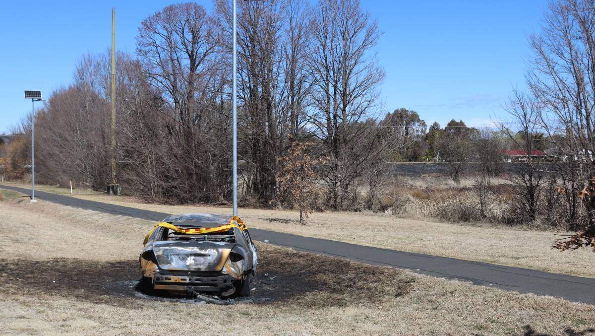 A burnt stolen vehicle at Dumaresq creeklands in Armidale. Picture by Heath Forsyth