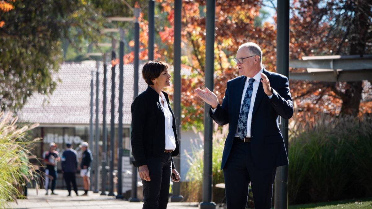 Special Representative for Australian Agriculture, Su McCluskey, and UNE Vice-Chancellor Professor Chris Moran in discussion on the UNE Armidale campus this week. Picture supplied 
