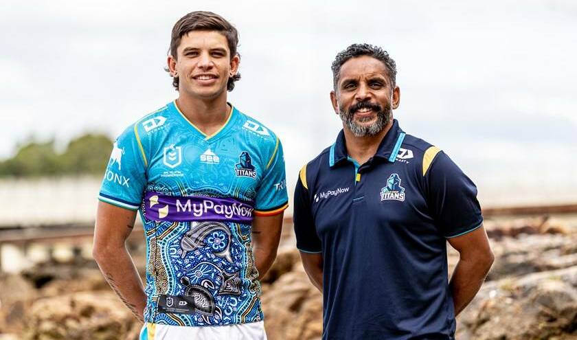 Campbell with his son Jayden, who now plays NRL for the Titans. Preston has received an OAM for his work with Indigenous youth. Photo supplied 