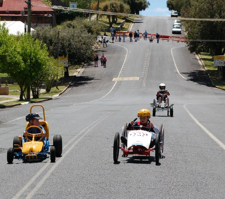 Speed freaks: The billy cart derby on Saturday morning is always a big hit with adults and children alike..