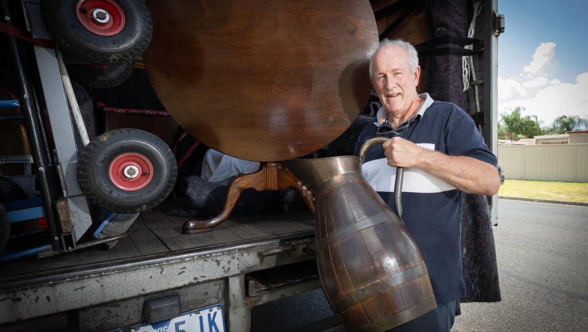 Antiques dealer Graeme Davidson has driven from Victoria to take part in the weekend fair at Armidale Town Hall. Photo - Peter Hardin
