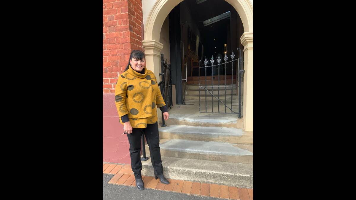 Tenterfield Mayor Bronwyn Petrie outside the Sir Henry Parkes School of Arts, which is owned by the National Trust and where black is used for the building's trims. 