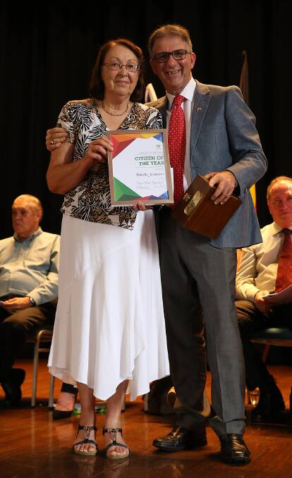 RECENT WINNERS: 2016 Citizen of the Year Nanette Jemmeson receives her award from 2015 recipient Phil Wheaton.