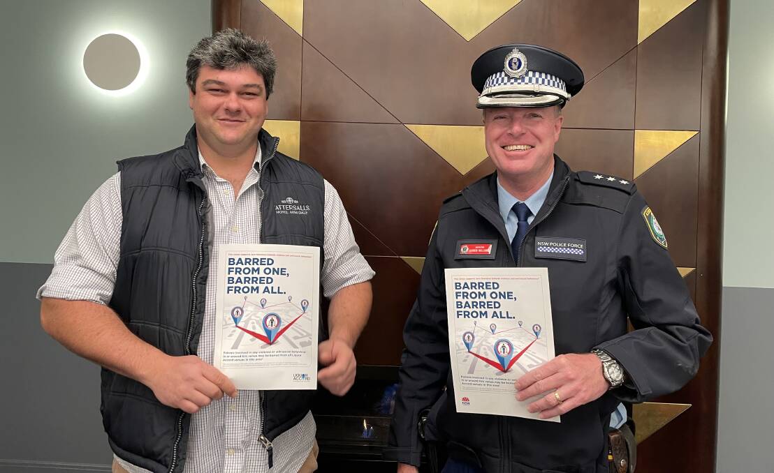 Armidale Liquor Accord president John Cassidy with police officer-in-charge Inspector Darren Williams. Picture supplied