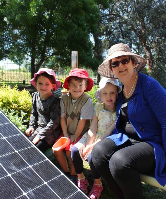 SUSTAINABLE STUDENTS: Charlise, Toby, Eleanor and Jane Schutz with their brand new solar panel at the Saint Peter's Preschool. The preschool has started a crowdfunding campaign to promote sustainability to the children.