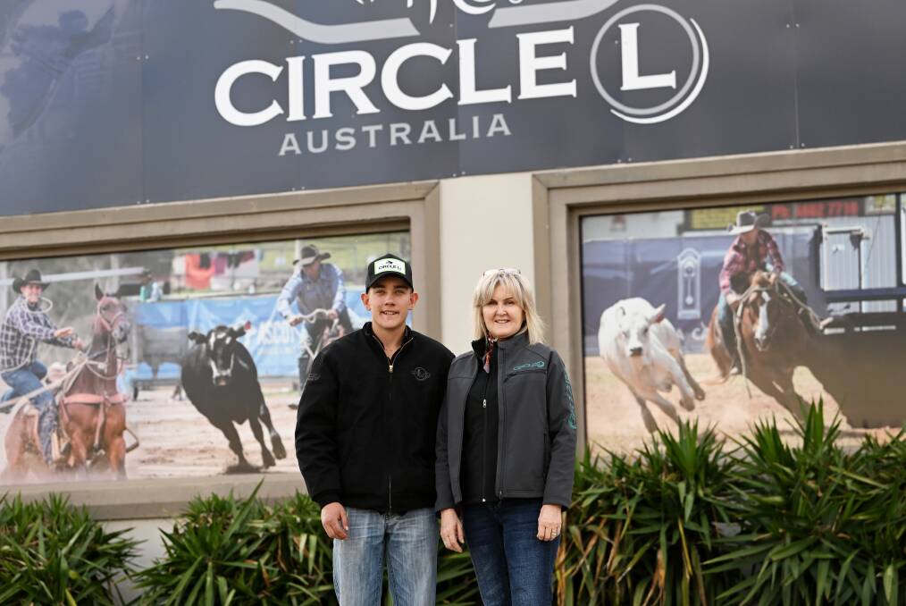Dustin Hone with Circle L Tamworth store manager Helen McVicar. The company have sponsored the Uralla shooter for his upcoming World Championships tourney. Picture by Gareth Gardner