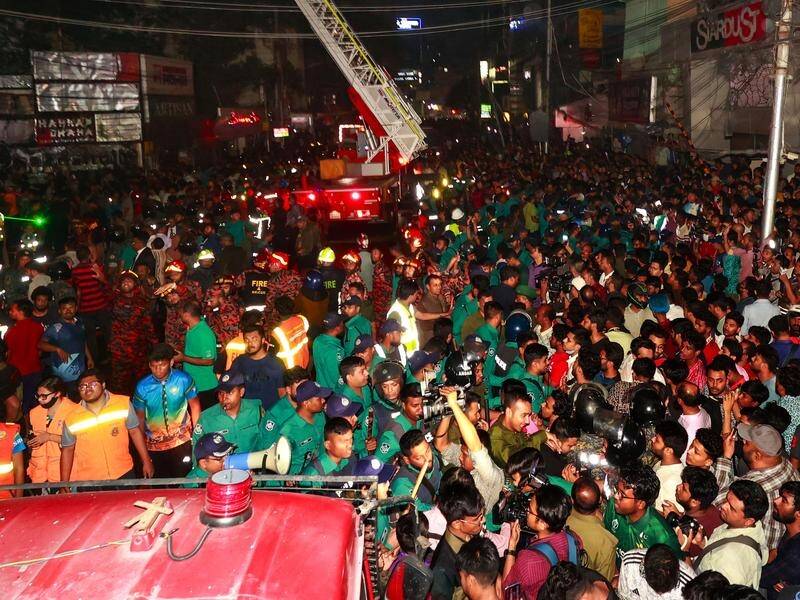 Bangladeshi officials say gas cylinders may have caused a fire that's killed at least 45 people. (EPA PHOTO)