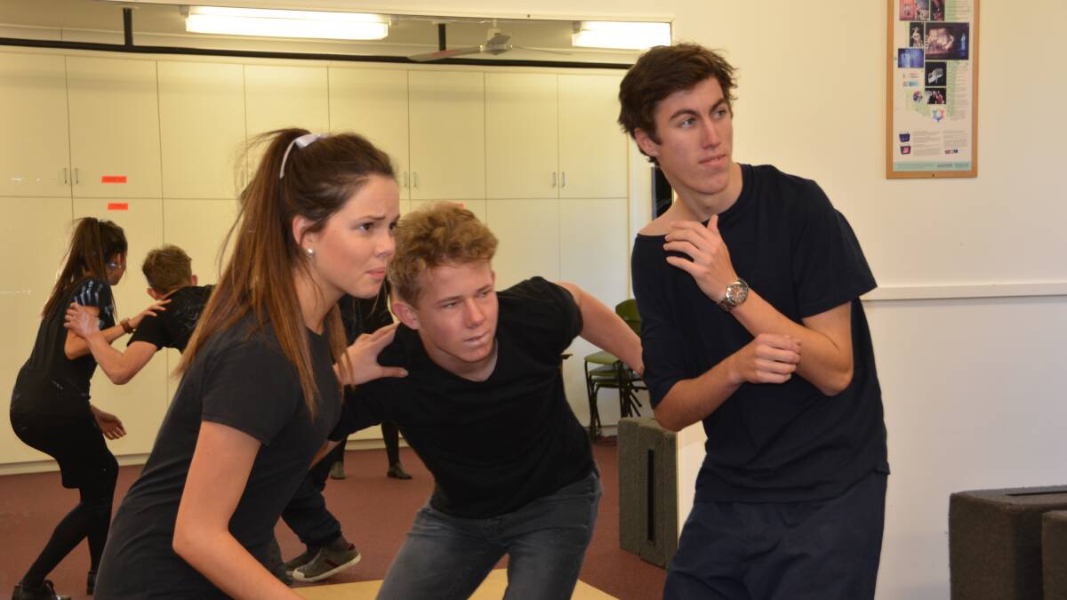 TO BE OR NOT TO BE: From left, Kaliya Alldridge, Hugh Worsley and George Lane practice their piece from A Midsummer Night’s Dream for the 2016 Shakespeare Carnival which they performed in Sydney on Saturday.